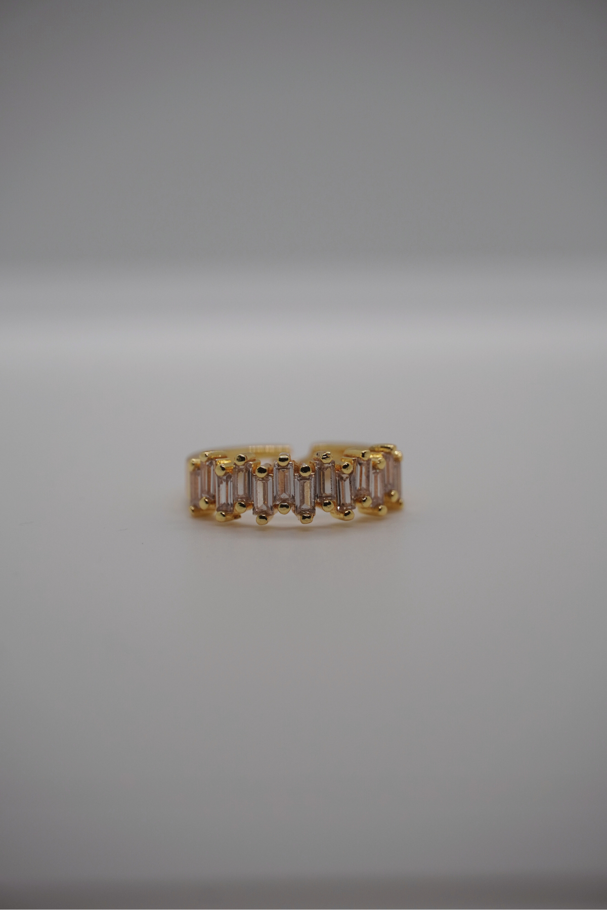 Glowy Ring in Gold mit rechteckigen Schmucksteinen